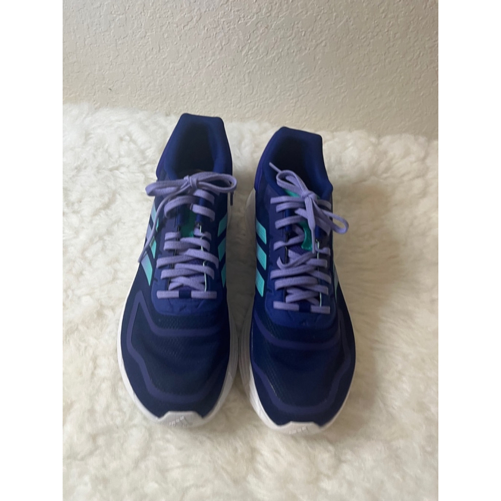 Adidas LightMotion Running Shors Men's size 11
Purple with teal 3 stripe
